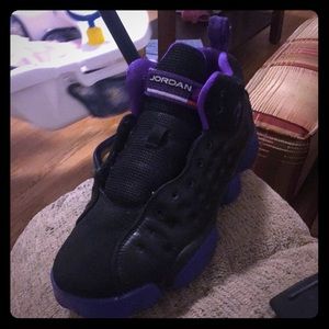 Black and purple Jordan’s size 4.5 youth